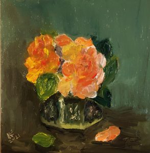 Orange rose in green vase