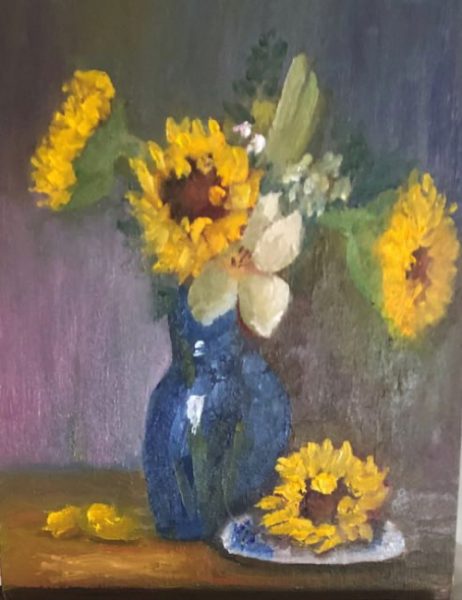 Sunflowers in glass