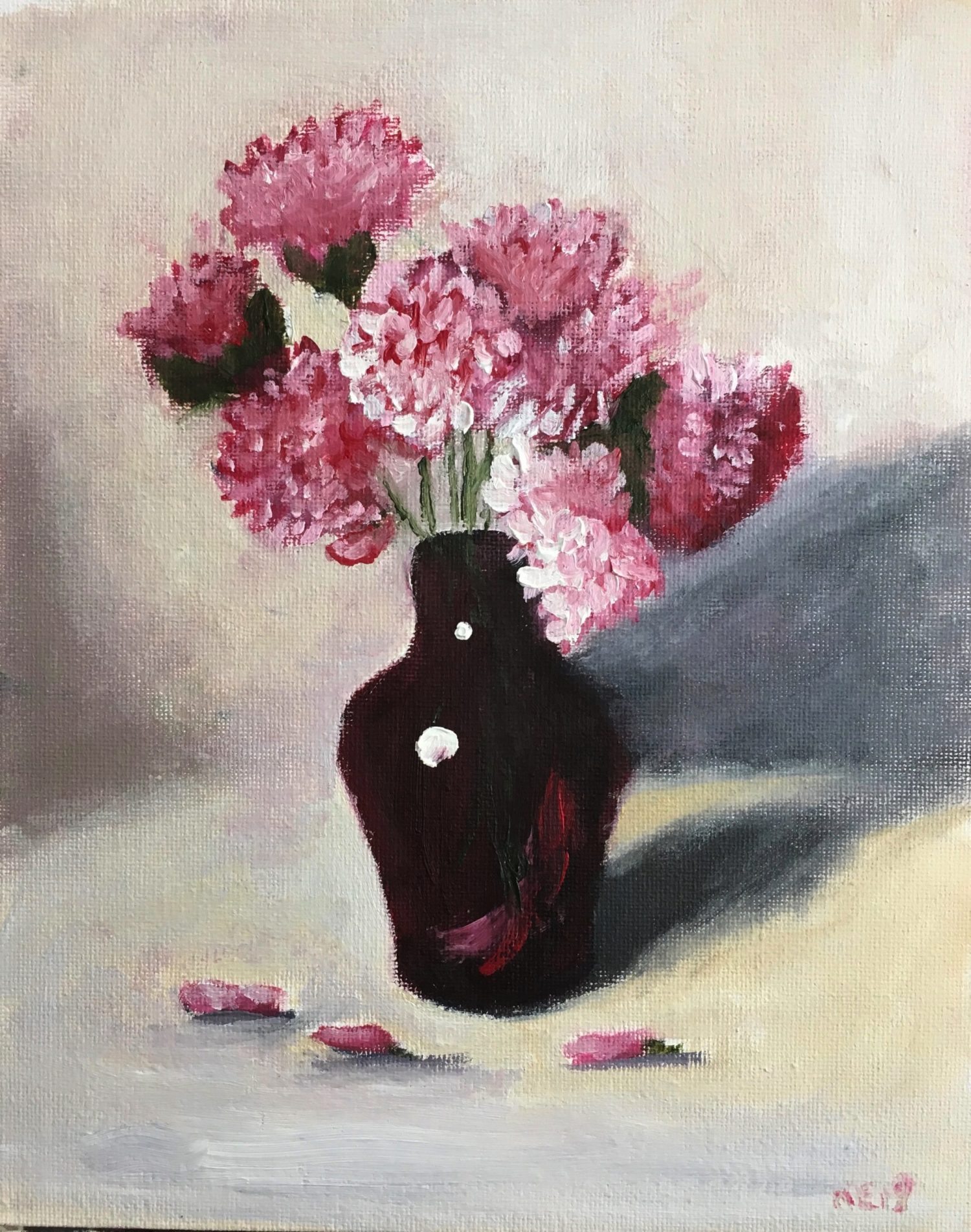 Pink carnations in ruby vase